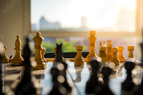 Chess game Wooden chess pieces on a chess Board