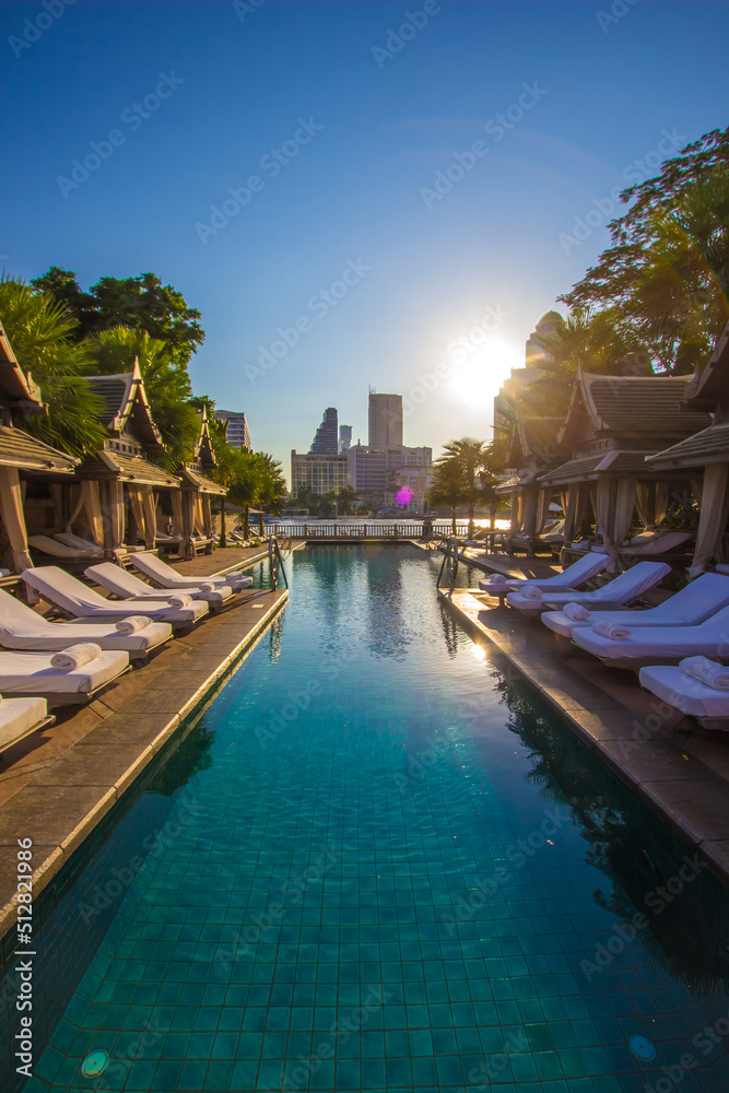 Charoennakorn Road,Klongsan,Bangkok,Thailand on February 19,2019:Beautiful landscape at the swimming pool of The Peninsula Bangkok Hotel by day.