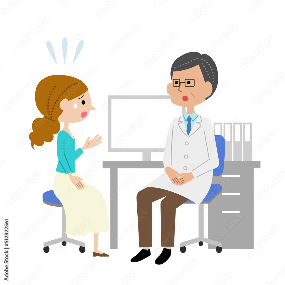 診察室で男性医師に不安を話す若い女性