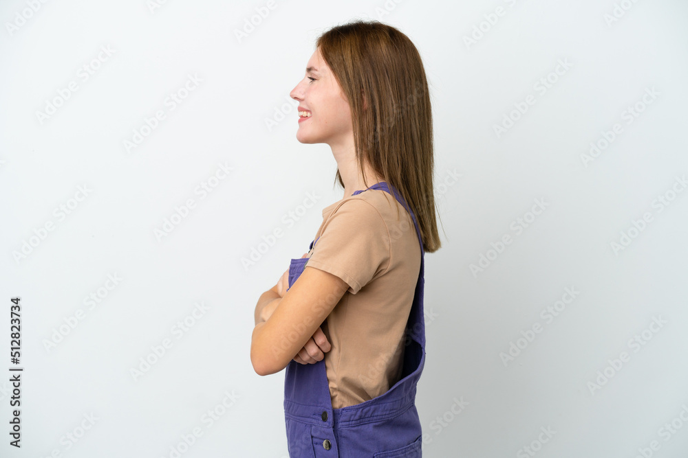 Young English woman isolated on white background in lateral position Young English woman isolated on white background in lateral position