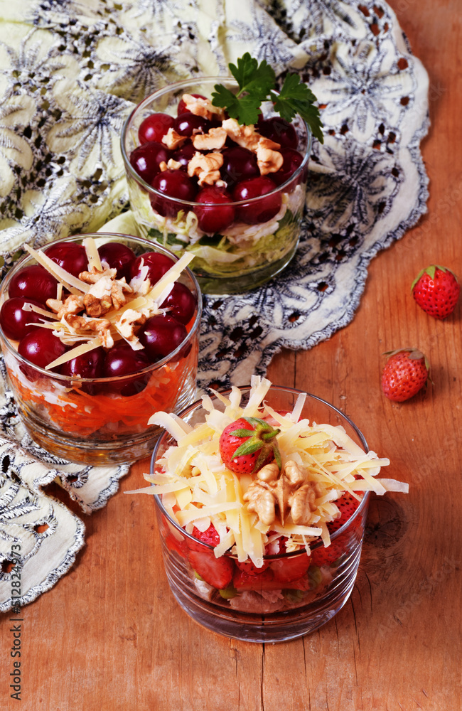Salads in glasses. With meat and without meat. With berries.