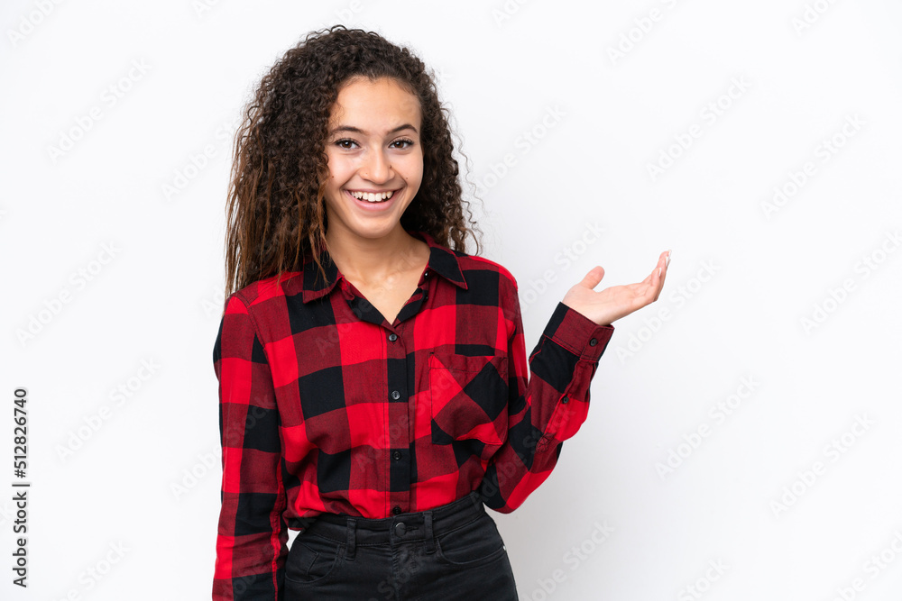 Young Arab woman isolated on white background holding copyspace imaginary on the palm to insert an ad Young Arab woman isolated on white background holding copyspace imaginary on the palm to insert an ad