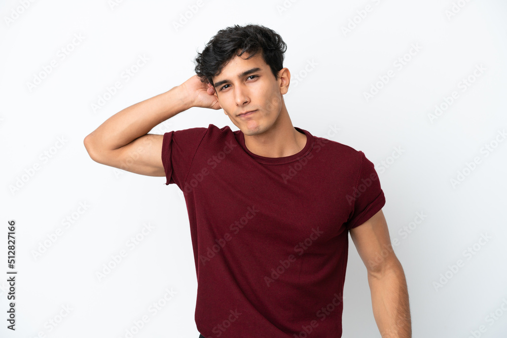 Young Argentinian man isolated on white background having doubts Young Argentinian man isolated on white background having doubts