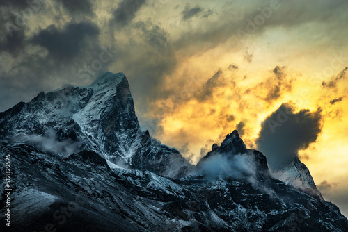 View of Taboche mountain peaks  in Sagarmatha national park in Himalayas at sunset. T Route to Everest base camp.
 photo