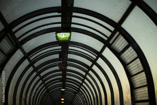 Tunnel in evening. Lamps in pedestrian crossing. Architecture details.