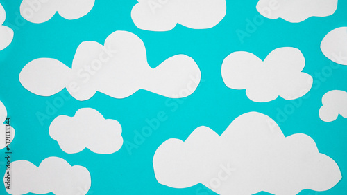 Paper clouds on a blue background