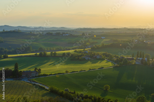 Landscape of the hills of Monferrato in Piedmont in Northern Italy at sunset time golden hour
