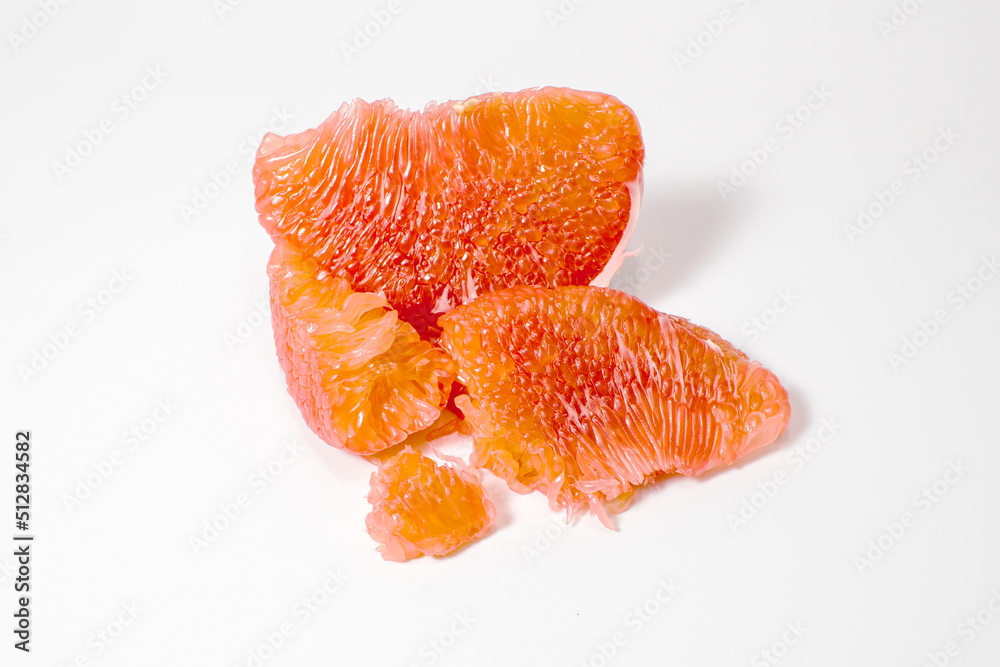 Red pomelo pulp isolated on white background. Red pomelo pulp isolated on white background.