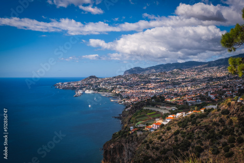 Fototapeta Naklejka Na Ścianę i Meble -  Panoramic view over Funchal, from Miradouro das Neves viewpoint, Madeira island, Portugal. October 2021