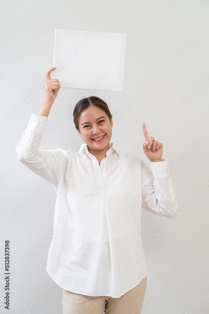Asian women holding white board. Advertising copyspace Asian women holding white board. Advertising copyspace
