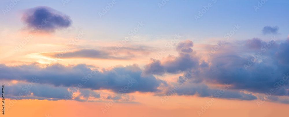 Panorama of Majestic pastel sunrise sundown sky background with dramatic colorful clouds