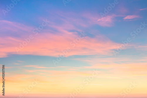 Pastel colors of sundown sunset sky with beautiful light clouds