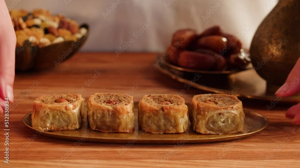 Turkish sweet dish, Baklava close-up. Arabian treats. Middle eastern national sugar food, dessert snack. Turkish sweet dish, Baklava close-up. Arabian treats. Middle eastern national sugar food, dessert snack.