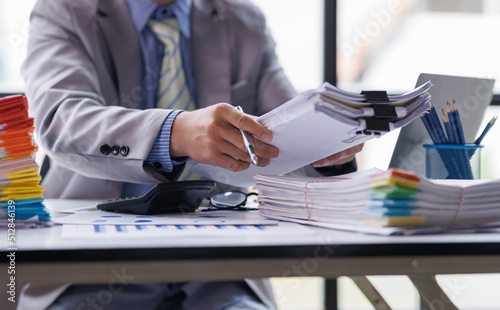 Fotografie Business Documents, Auditor businesswoman checking searching document legal prep