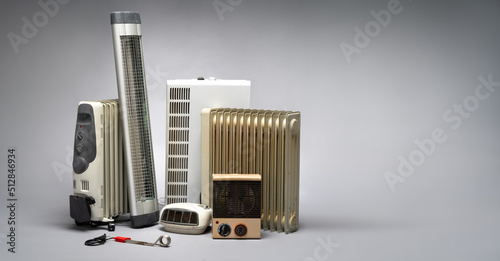 Group of different heaters (infrared, oil, radiator, fan). Heating, energy crisis and consumption concept