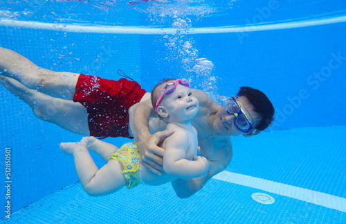 Underwater Baby swimming photo