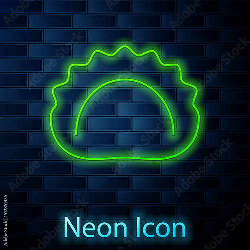 Glowing neon line Dumplings icon isolated on brick wall background. Pierogi, varenyky, pelmeni, ravioli. Traditional Ukrainian food. Vector