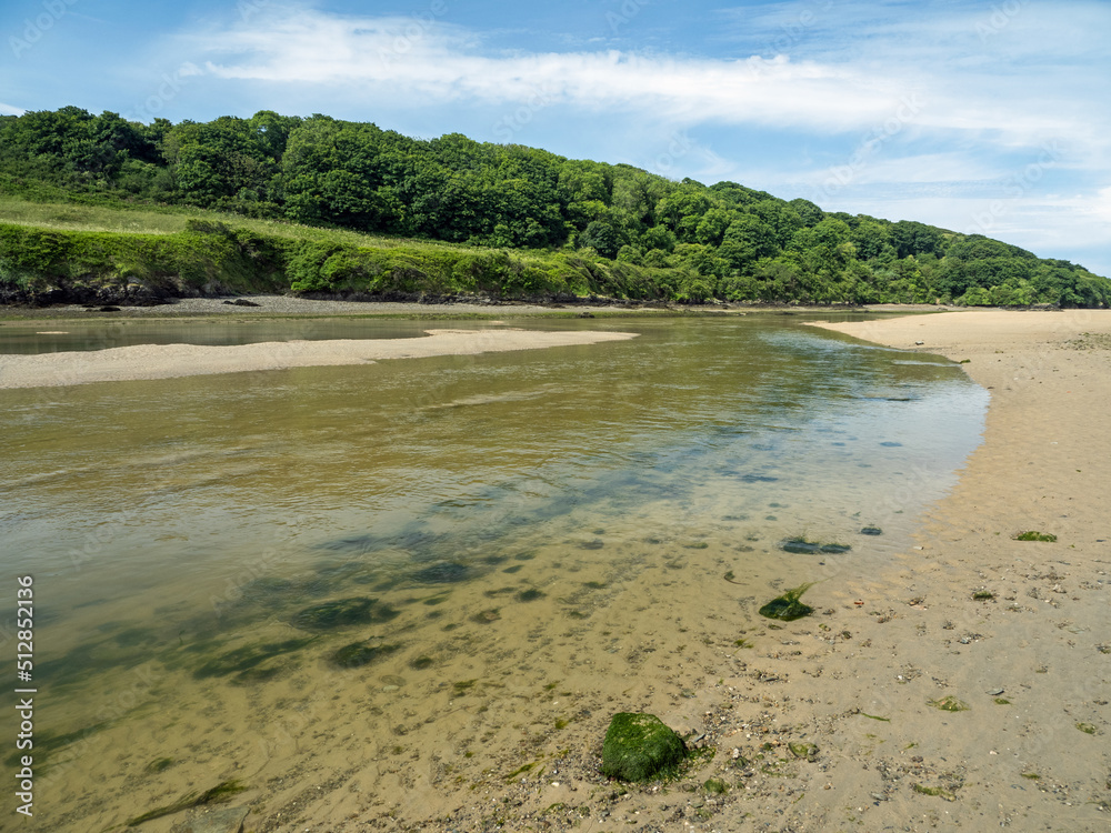 River Gannel at Low Tide heading towards Crantock Beach near Newquay in Cornwall