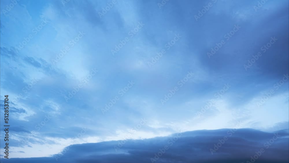 Clouds after a storm at dusk.High and medium clouds, different directions of movement Clouds after a storm at dusk.High and medium clouds, different directions of movement