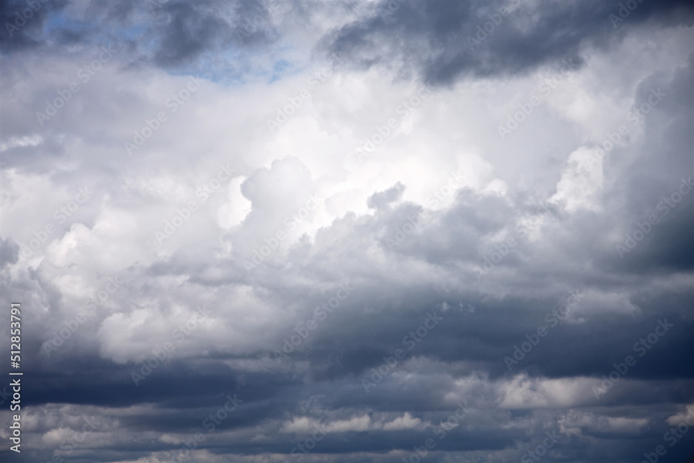 Weather background of storm clouds with hint of blue sky Weather background of storm clouds with hint of blue sky