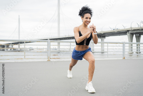 Sportswoman young woman training in sportswear, active exercises for health