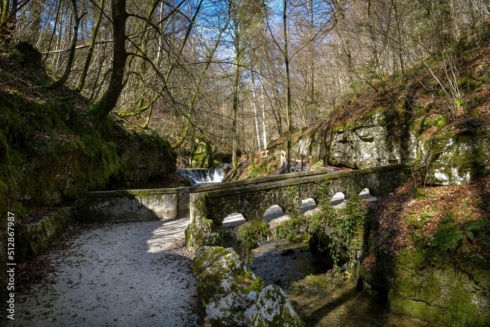 Stone bridge across Verena stream in Verena gorge in Switzerland Stone bridge across Verena stream in Verena gorge in Switzerland