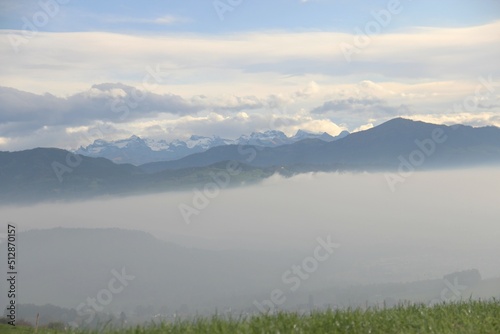 Morning fog with the alps in the background © Claire