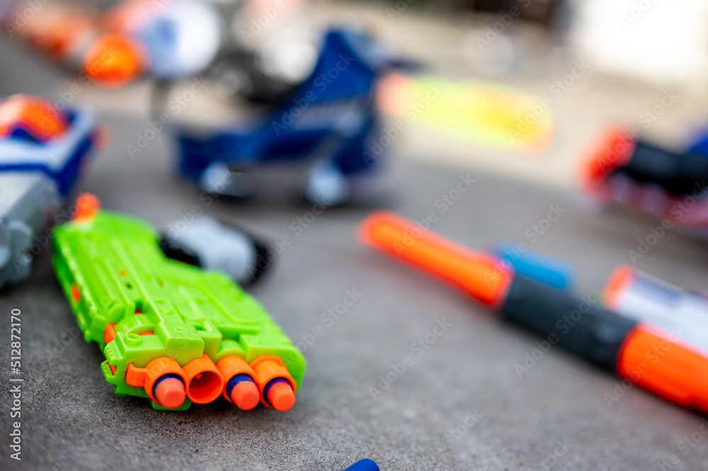 Soft foam dart gun loaded and ready for use by children.