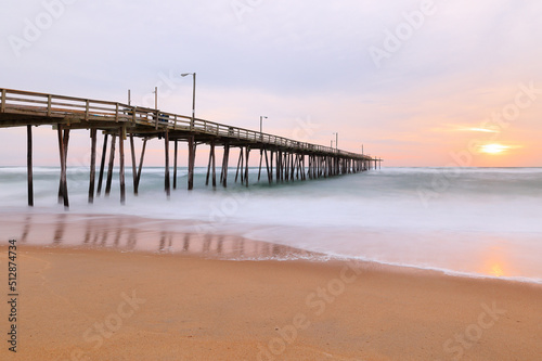 Beautiful sunrise at Nags Head Pier  Outer Banks  North Carolina  USA.  Nags Head is one of the most popular beach of the outer Banks for its  wealth of amenities  sprawling ocean and soundfront view