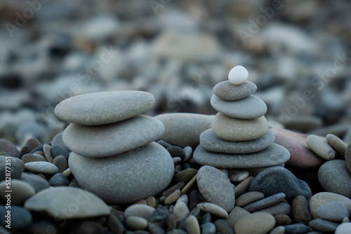 stone  balance  beach  pebble  rock  zen  stack  sea  stones  nature  water  harmony  spa  stability  tranquil  stacked  meditation  heap  relaxation  rocks  ocean  tower  pyramid  summer  calm