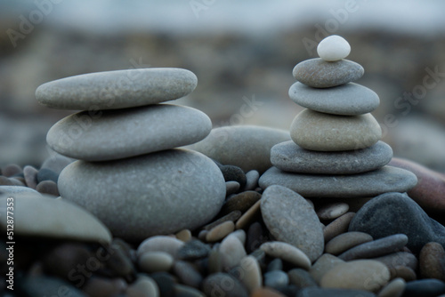 stone  balance  beach  pebble  rock  zen  stack  sea  stones  nature  water  harmony  spa  stability  tranquil  stacked  meditation  heap  relaxation  rocks  ocean  tower  pyramid  summer  calm