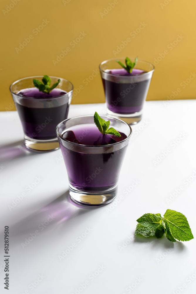 berry jelly in a glass with mint berry jelly in a glass with mint