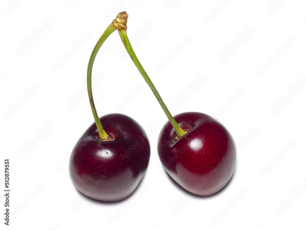 Juicy cherries on a white background. Useful food. Beautiful berries isolate. Ripe berries on the table. Juicy cherries on a white background. Useful food. Beautiful berries isolate. Ripe berries on the table.