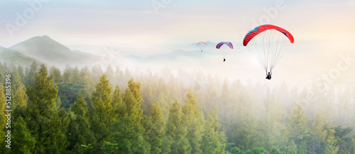 Obraz na płótnie Paragliding in the sky