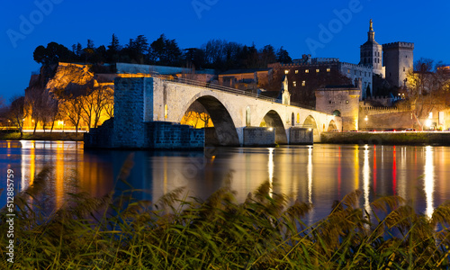 Fotografie, Obraz Pont Saint-Benezet and catholic Cathedral in Avignon in night lights, France