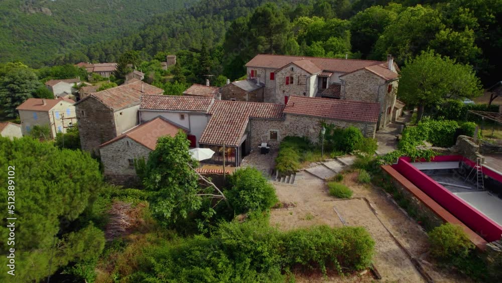 Approaching rustic villa in Branoux-les-Taillades Southern France with empty pool area for remodeling, Dolly in approach shot Approaching rustic villa in Branoux-les-Taillades Southern France with empty pool area for remodeling, Dolly in approach shot