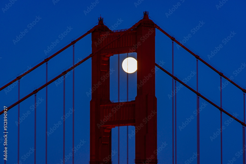 Fototapeta premium Full Moon June 2022 San Francisco Golden Gate Bridge Through North Tower Shot From Marin Headlands