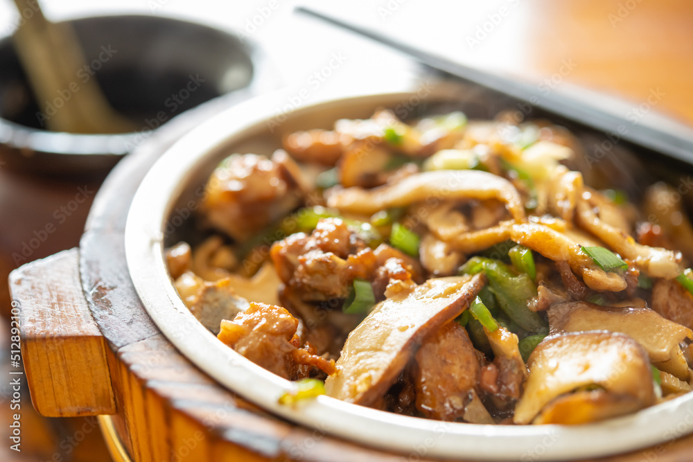 angle view fast food of fried chicken with slices of mushrooms with bowl of soup at horizontal composition angle view fast food of fried chicken with slices of mushrooms with bowl of soup at horizontal composition