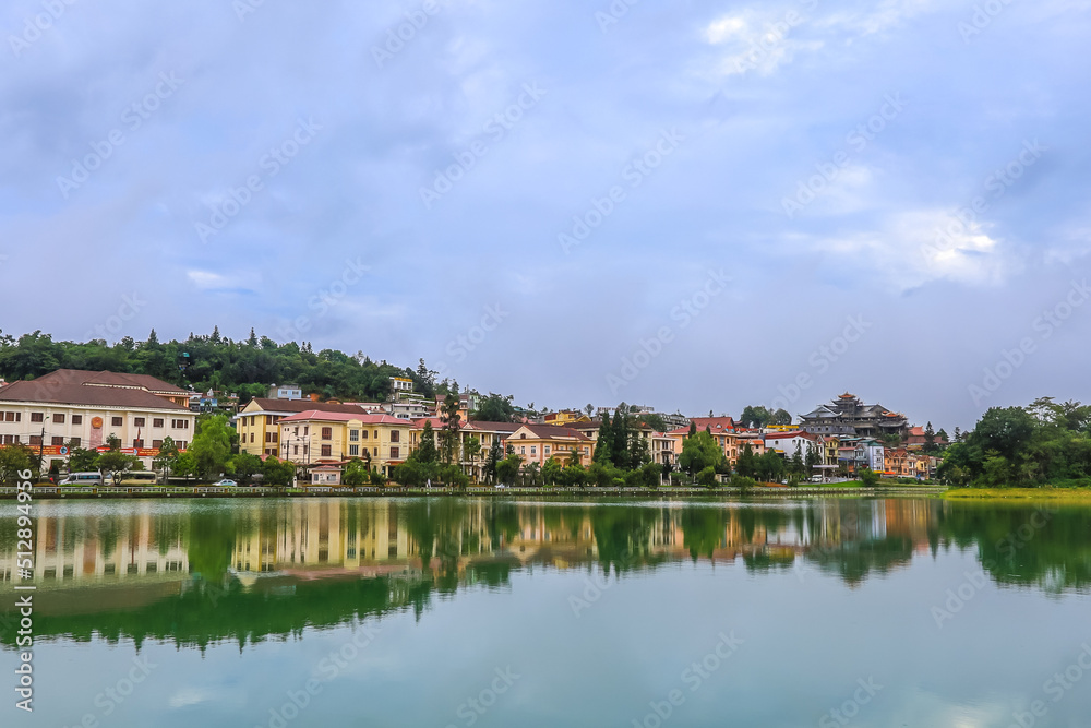 Obraz premium Lao Cai Province,north-west Vietnam on July 15,2019:Beautiful scene of Sapa Lake and Sapa town.