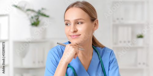 Beautiful young nurse in cl...