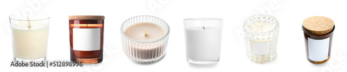 Set of aroma candles in holders on white background photo