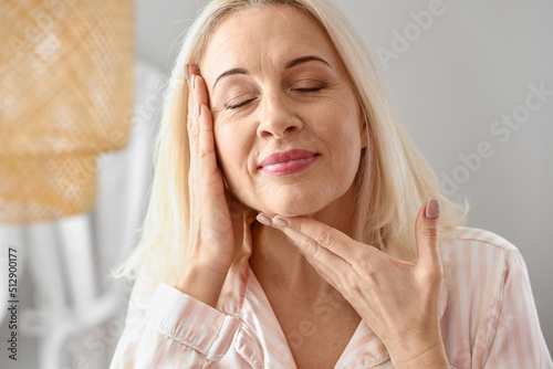Morning of mature woman giv...