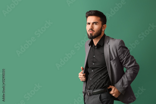 Fashionable bearded man on ...