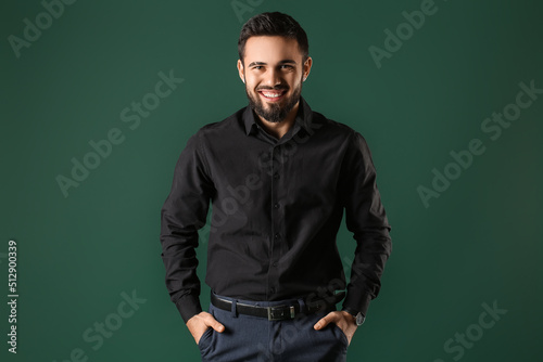 Bearded man keeping hands i...