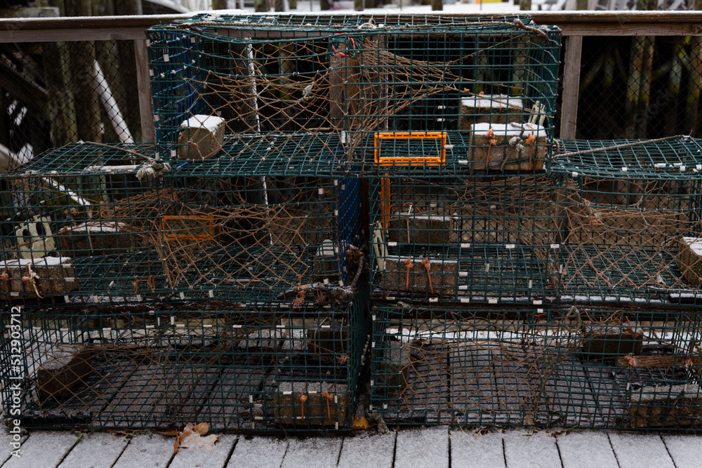 Lobster traps stacked on a dock on the coast of Maine. Acadia National Park. High-quality photo