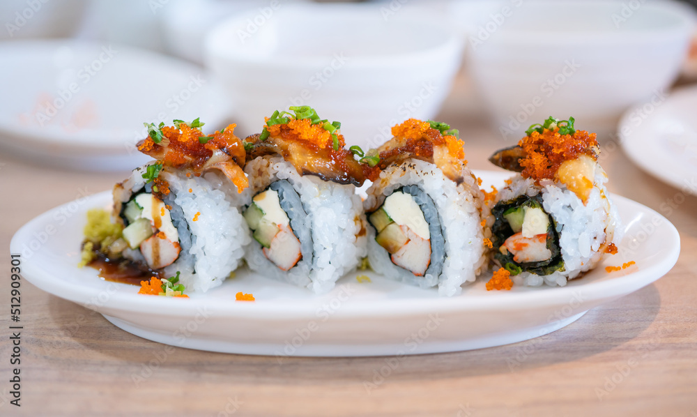 set of fresh sushi rolls with eel, Japanese food. set of fresh sushi rolls with eel, Japanese food.