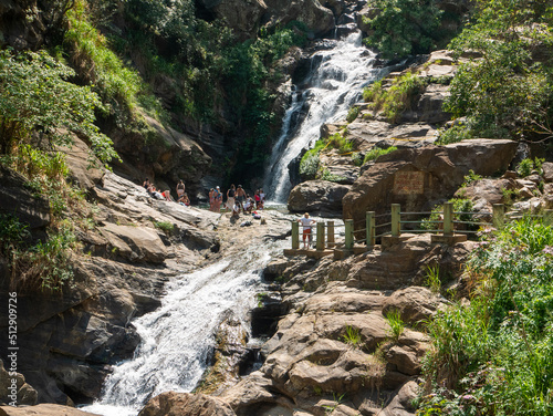 Ella, Sri Lanka - March 9, 2022: Beautiful view of the Ravana Ella waterfall, 25 meters high. People came to the waterfall and admire nature