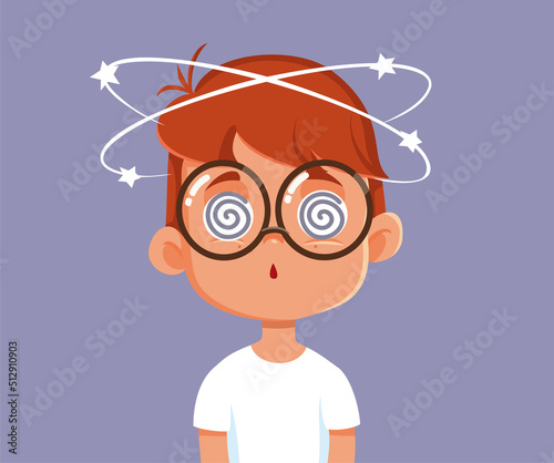 Little Boy Feeling Dizzy and Nauseated Vector Cartoon. Child suffering from exhaustion having blurry vision
 photo