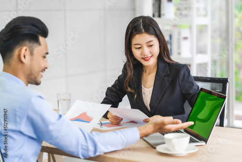 Fotografie Boss congratulating to asian businesswoman in glad action when successful projec