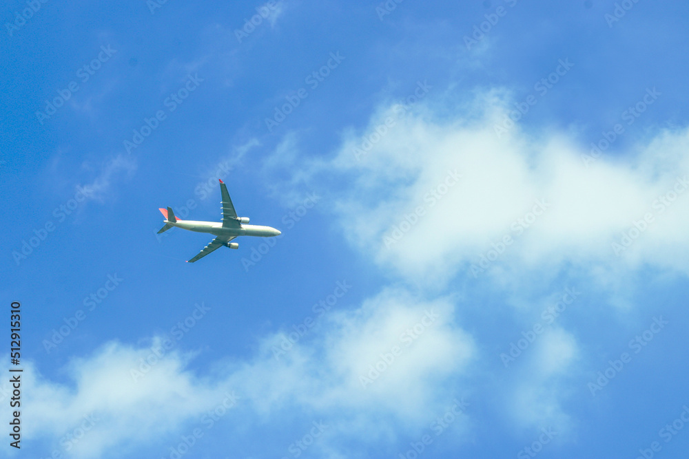 Soft focus shows the movement of an airplane flying in the sky. Soft focus shows the movement of an airplane flying in the sky.